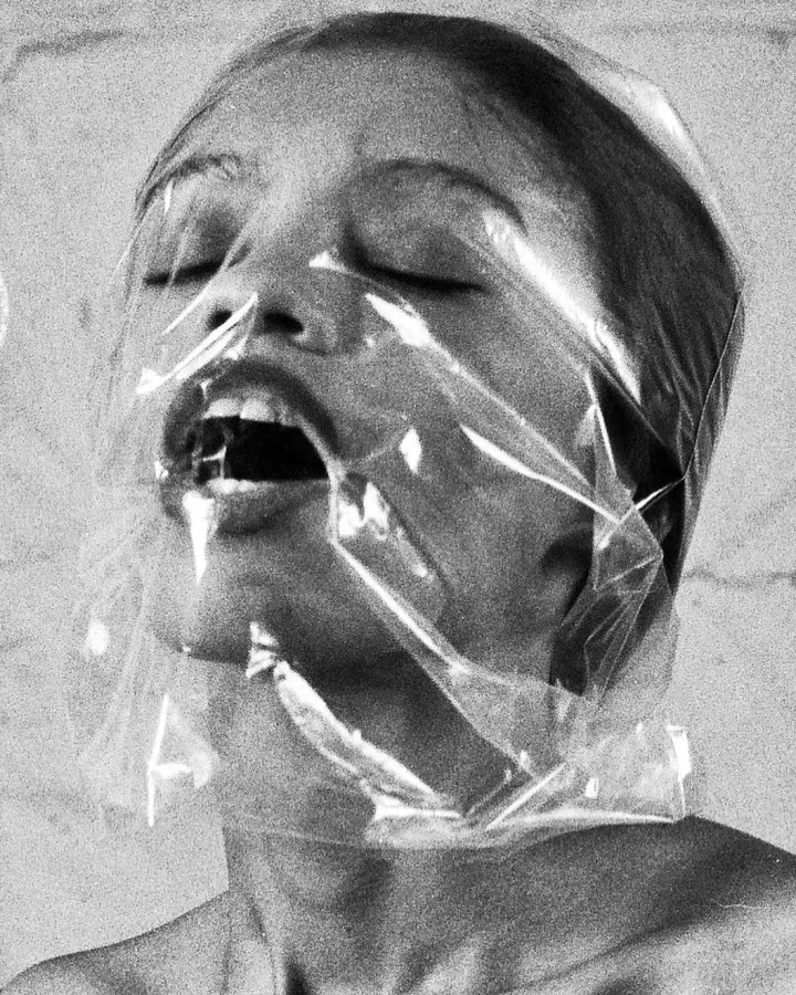 Portrait of a woman wrapped in cellophane — intimate portrait by Marco Miraglia