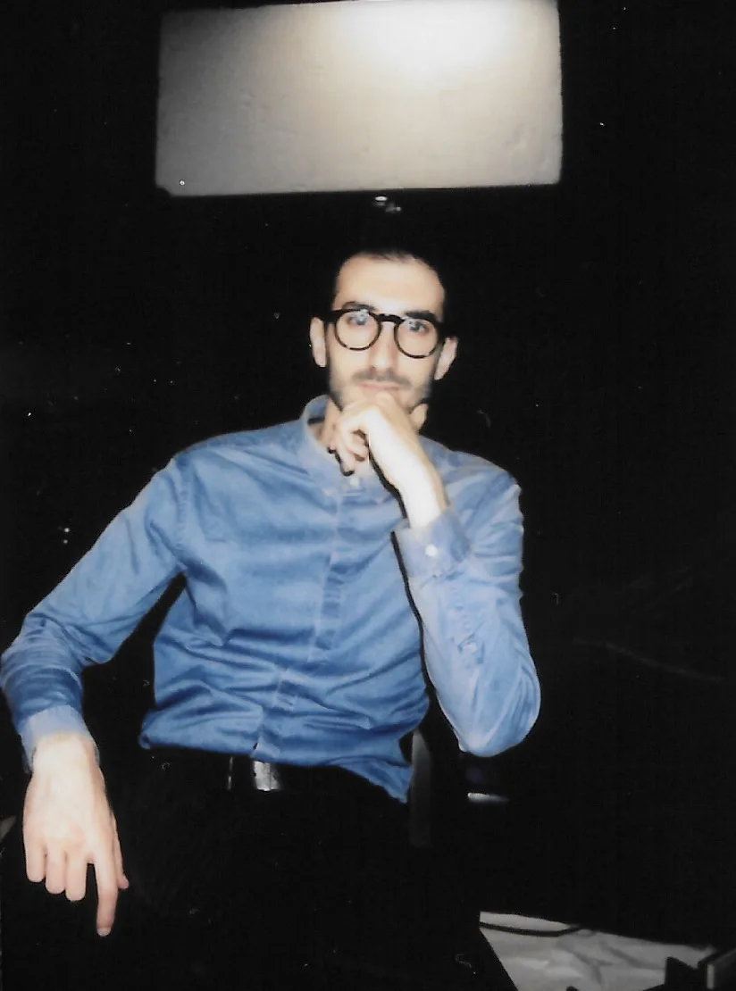 Marco Miraglia in director mode on a film set — instant photo