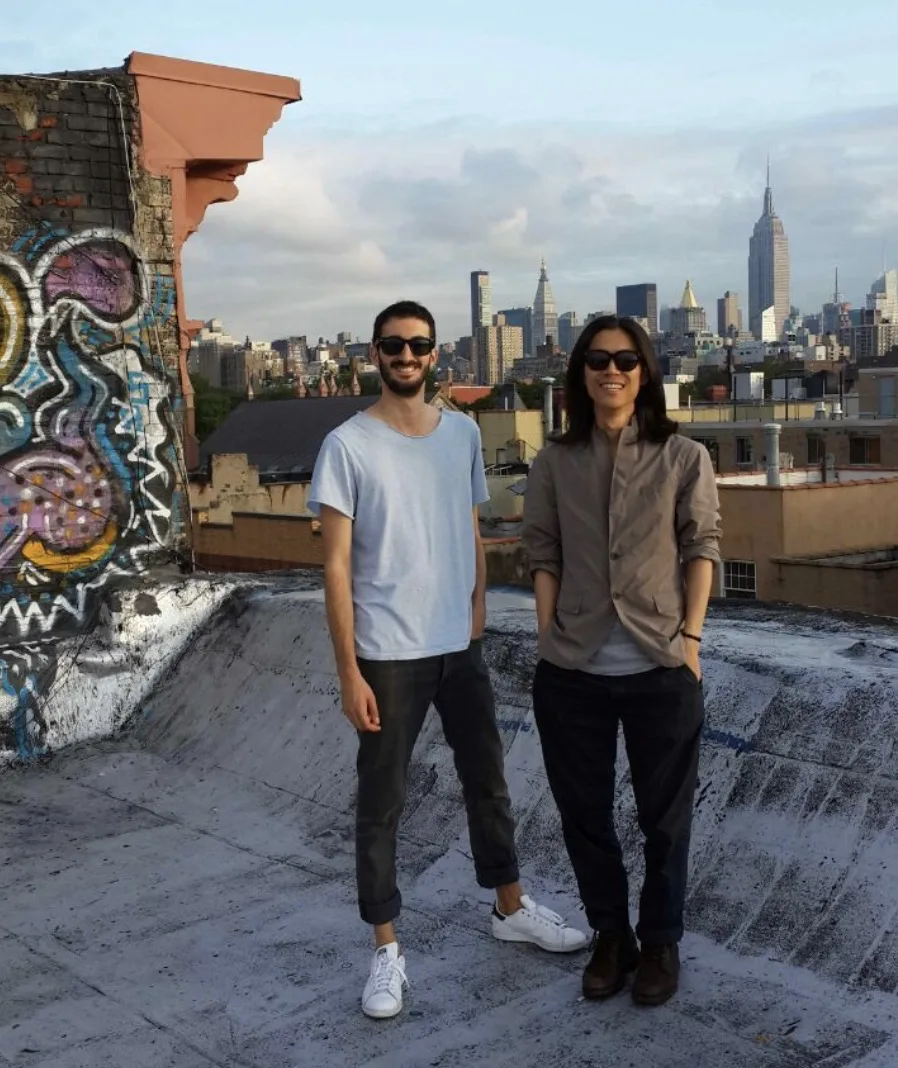 Marco Miraglia with director and producer Kimbo Kim on a New York rooftop, Empire State Building behind, December 2014