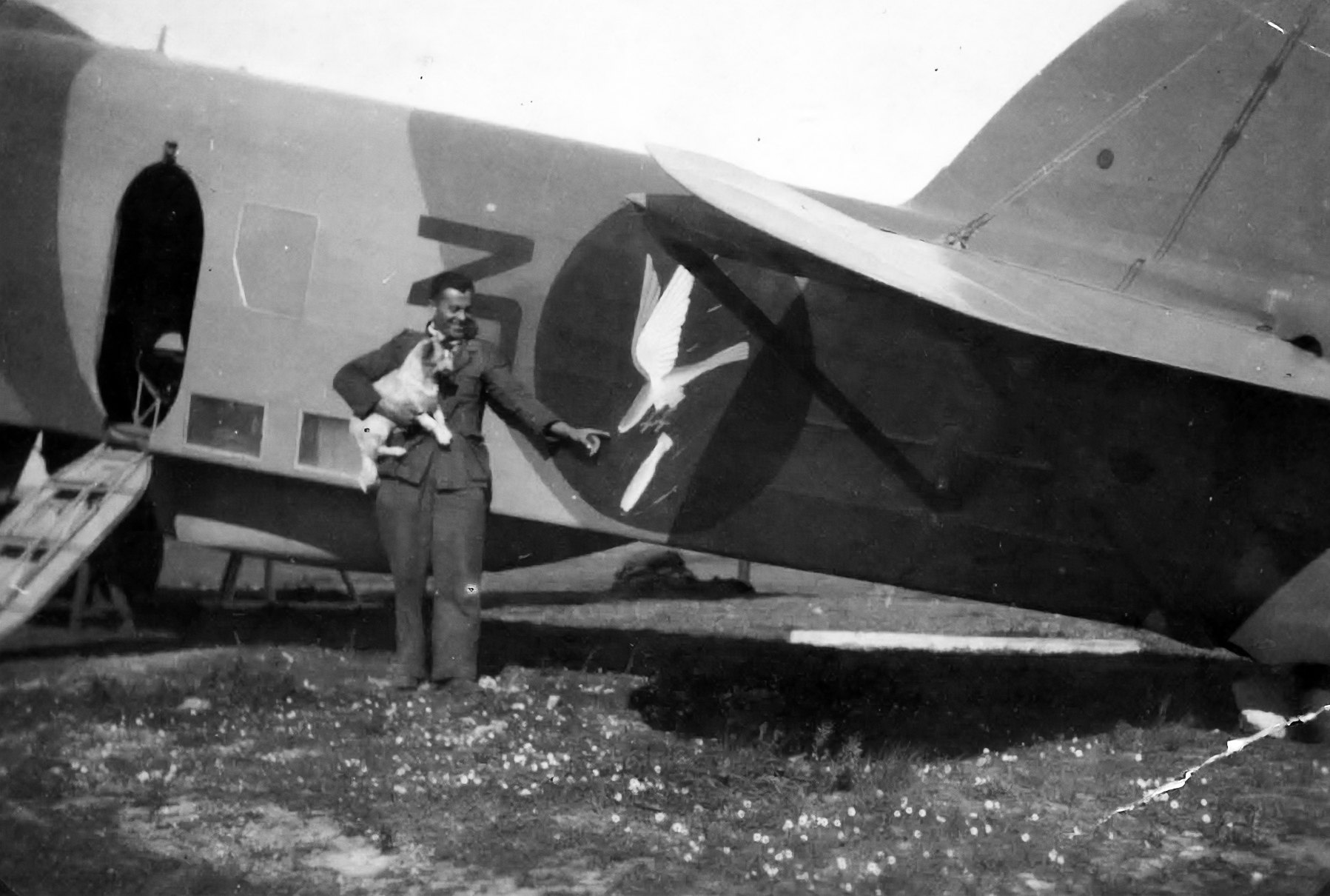 Michele Miraglia beside an aircraft