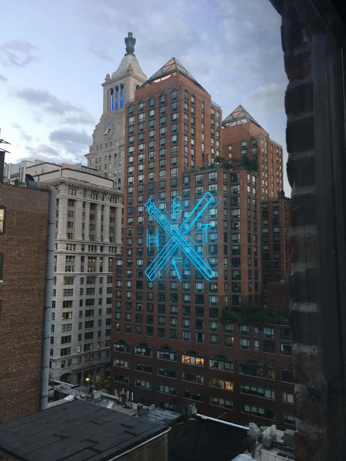 37thDegree neon logo on the office window, Manhattan