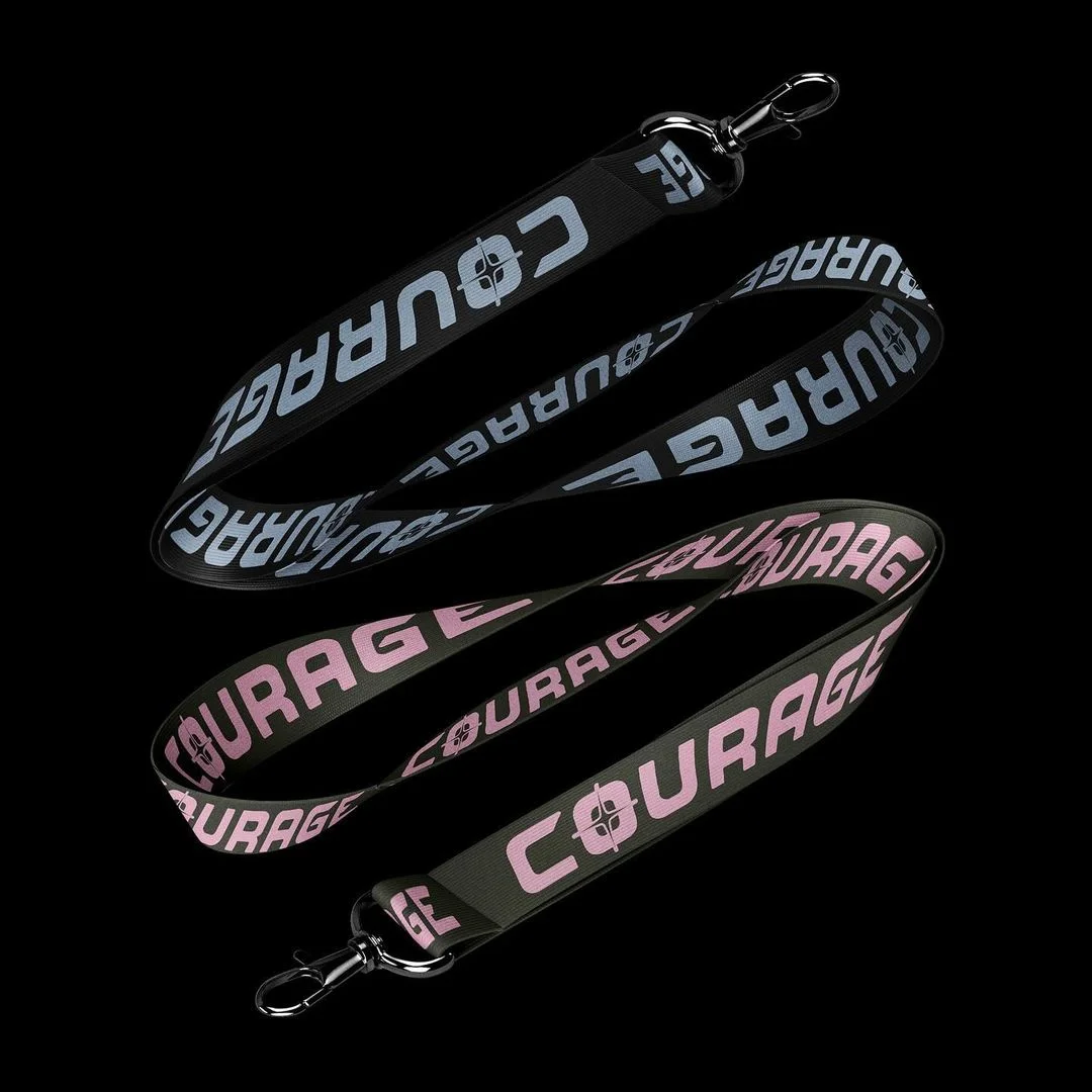 Courage Milano FW23 — pink and white Courage lanyards on black