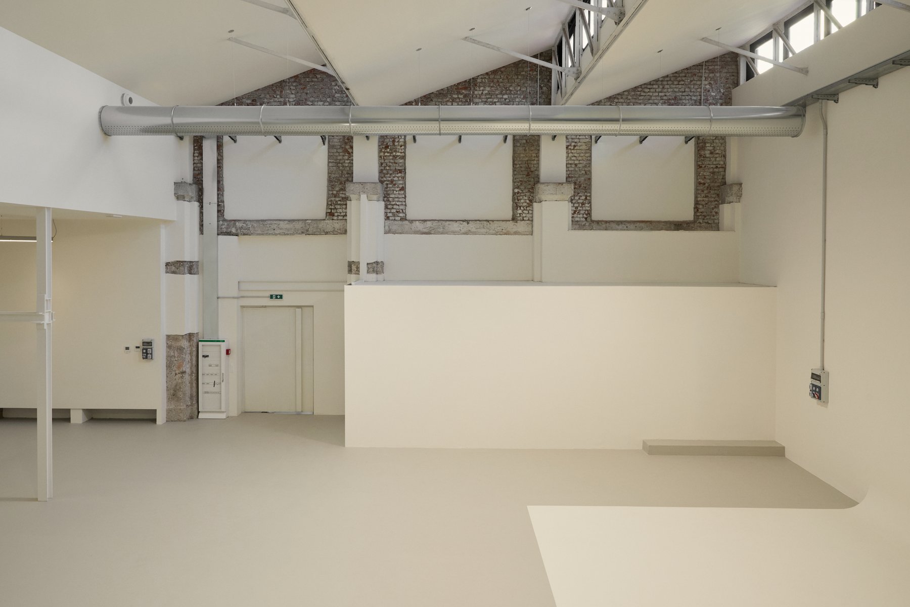 Spazio Sannio — industrial interior with brick wall